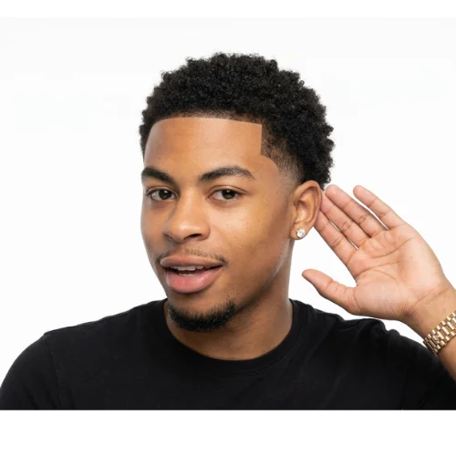 Black man with a burst fade and low taper haircut