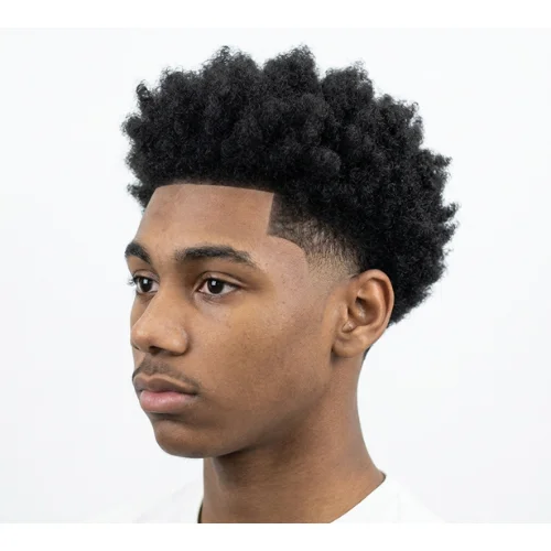 Black man with a temple taper and low taper fade haircut