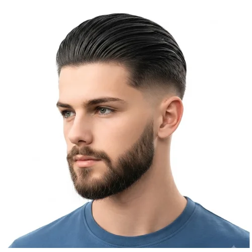 Man with slicked back hair, a low taper fade, and a neatly groomed beard on a white background.