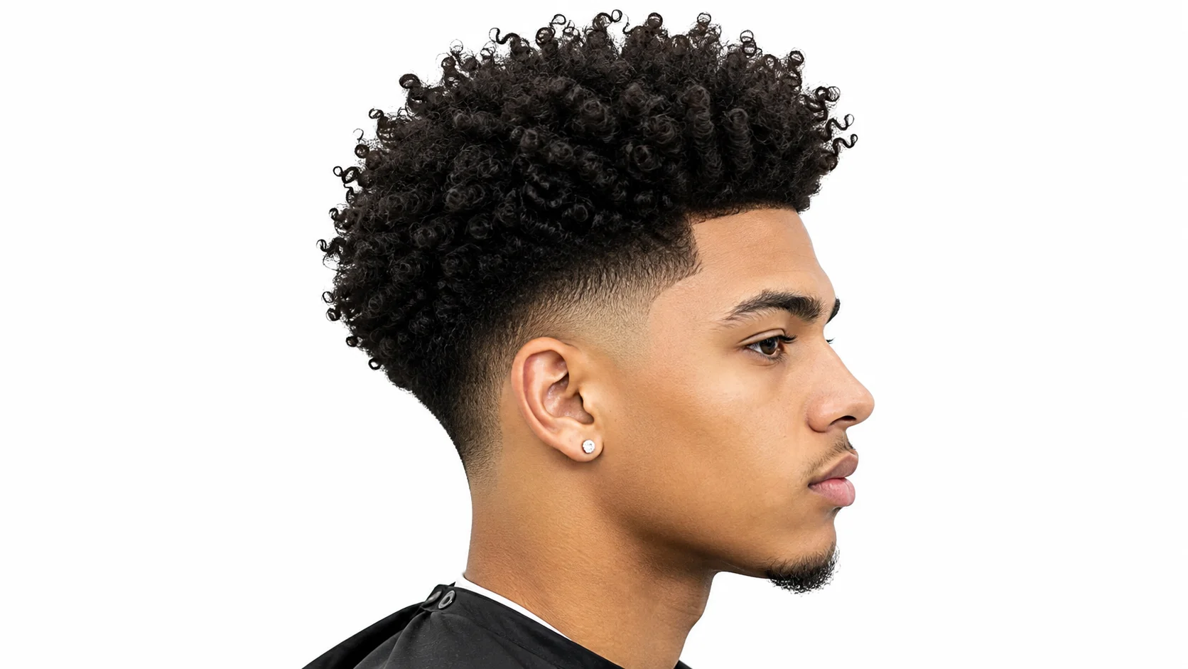 Taper Fade Blowout haircut with voluminous textured hair on top